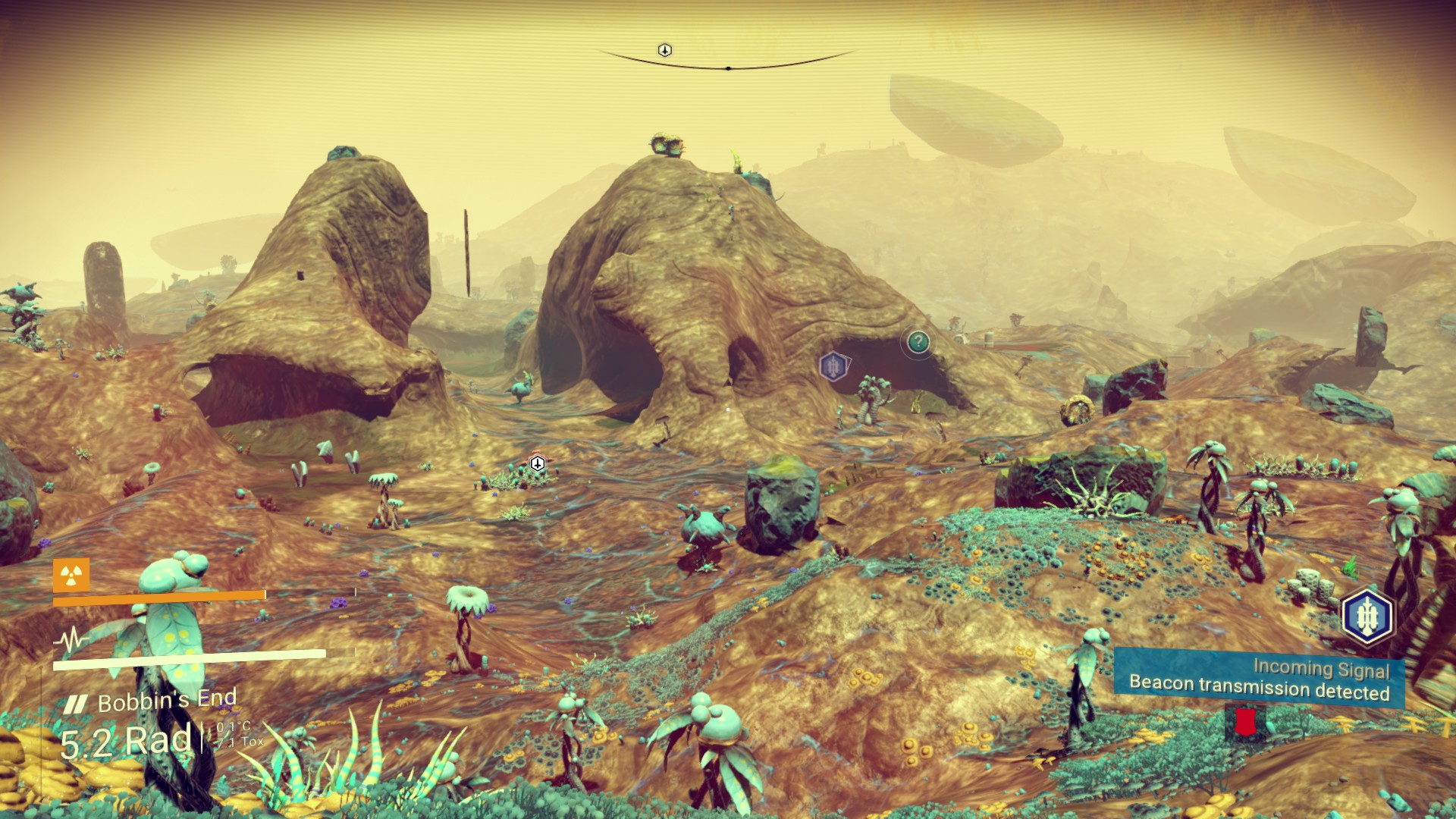 A screenshot from the launch version of No Man's Sky. It is a radioactive planet, an assortment of rocks and veins cover the landscape. It is not pleasing to the eye.