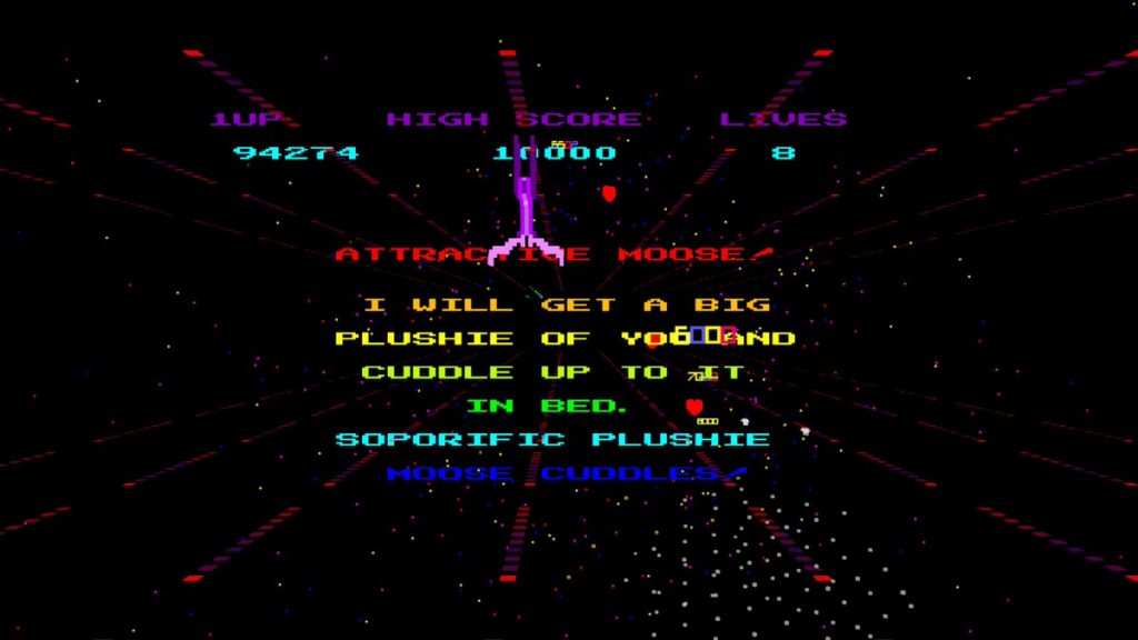 A screenshot from Moose Life. It's like a vidkidz arcade game circa 1983 except new. The screen has the text "attractive moose! I will get a big plushie of you and cuddle up to it in bed. Soporific plushie. Moose cuddles"